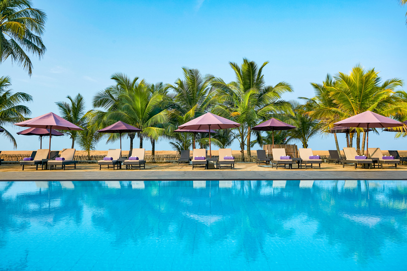 Relax and soak up the sun by the pristine beach and sparkling swimming pool in Mozambique