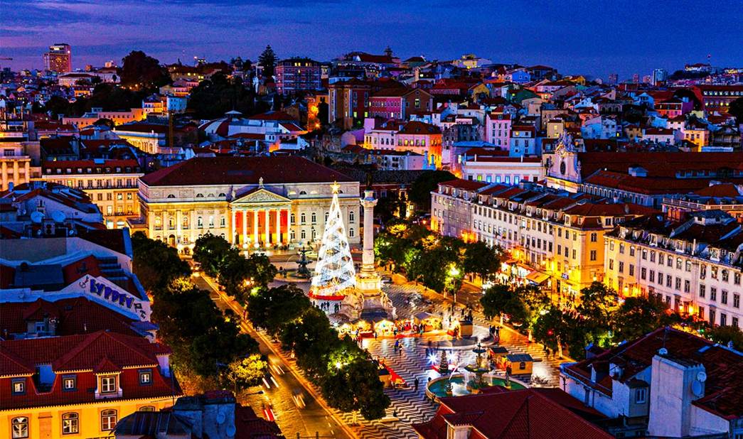 Praça Dom Pedro IV at Lisbon during Christmas with markets and festive lights