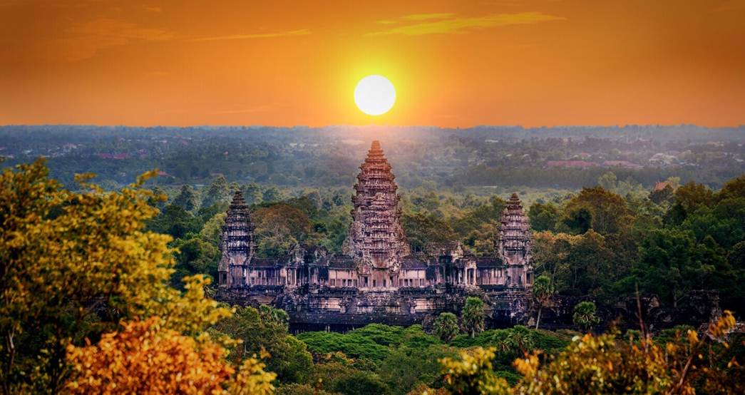 Angkor temple in Siem Reap with the sun at the back