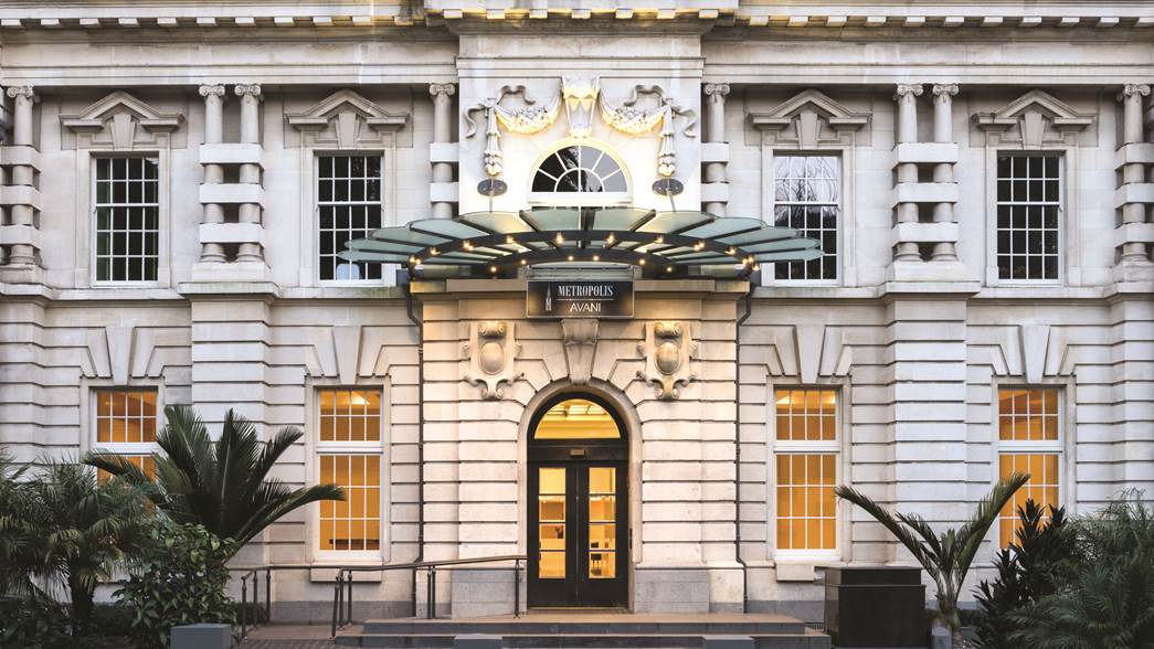 The main entrance and sign at Avani Auckland Metropolis Residences.