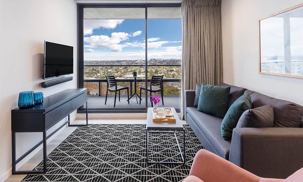 Spacious Living Room that leads out to a spacious private balcony