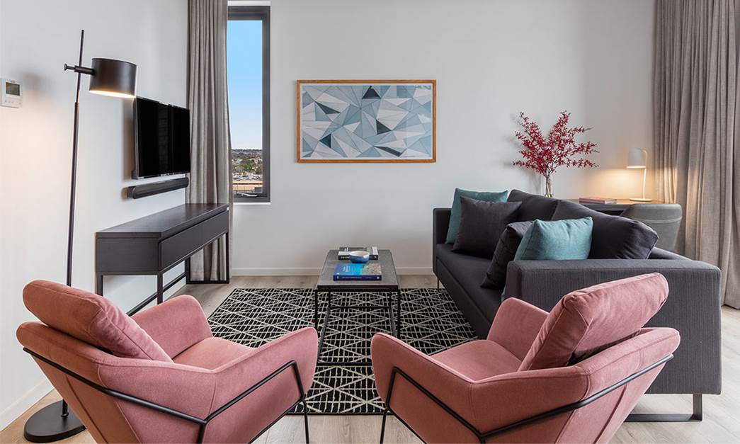 Comfortable designed modern living room with Smart TV and seating area