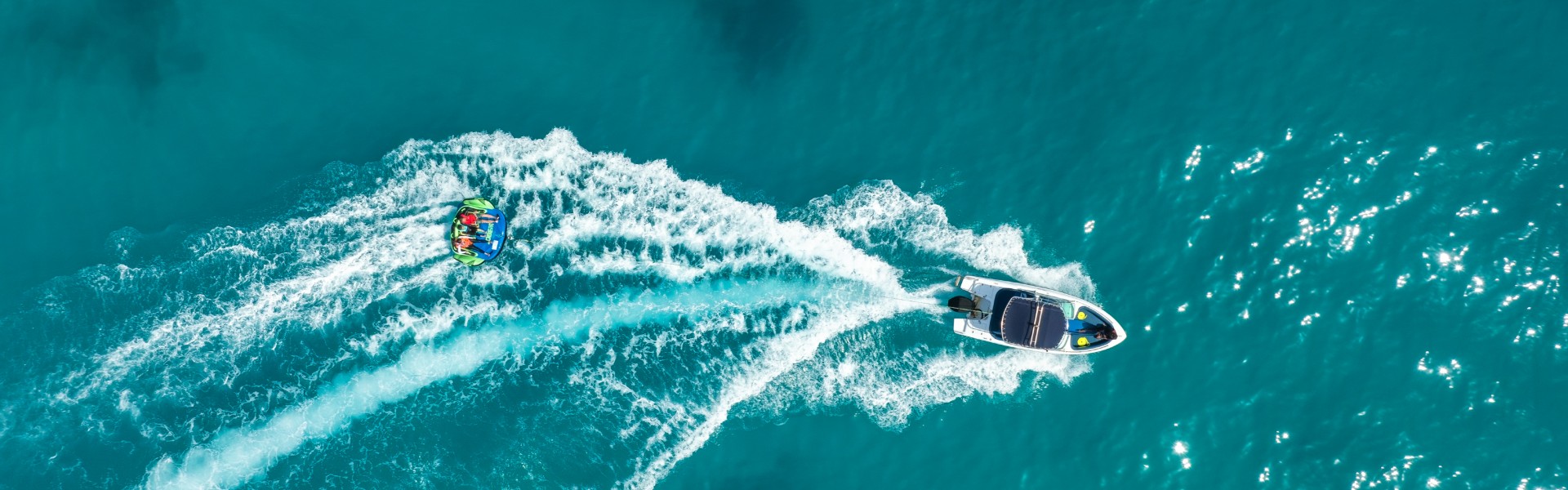 Water Sports - Guest Fun Tube Ride at Avani+ Fares Maldives Resort