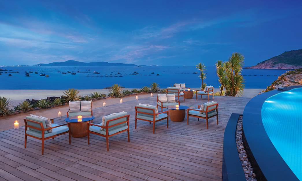 Night time view from Gio Pool Bar at Avani Quy Nhon Resort